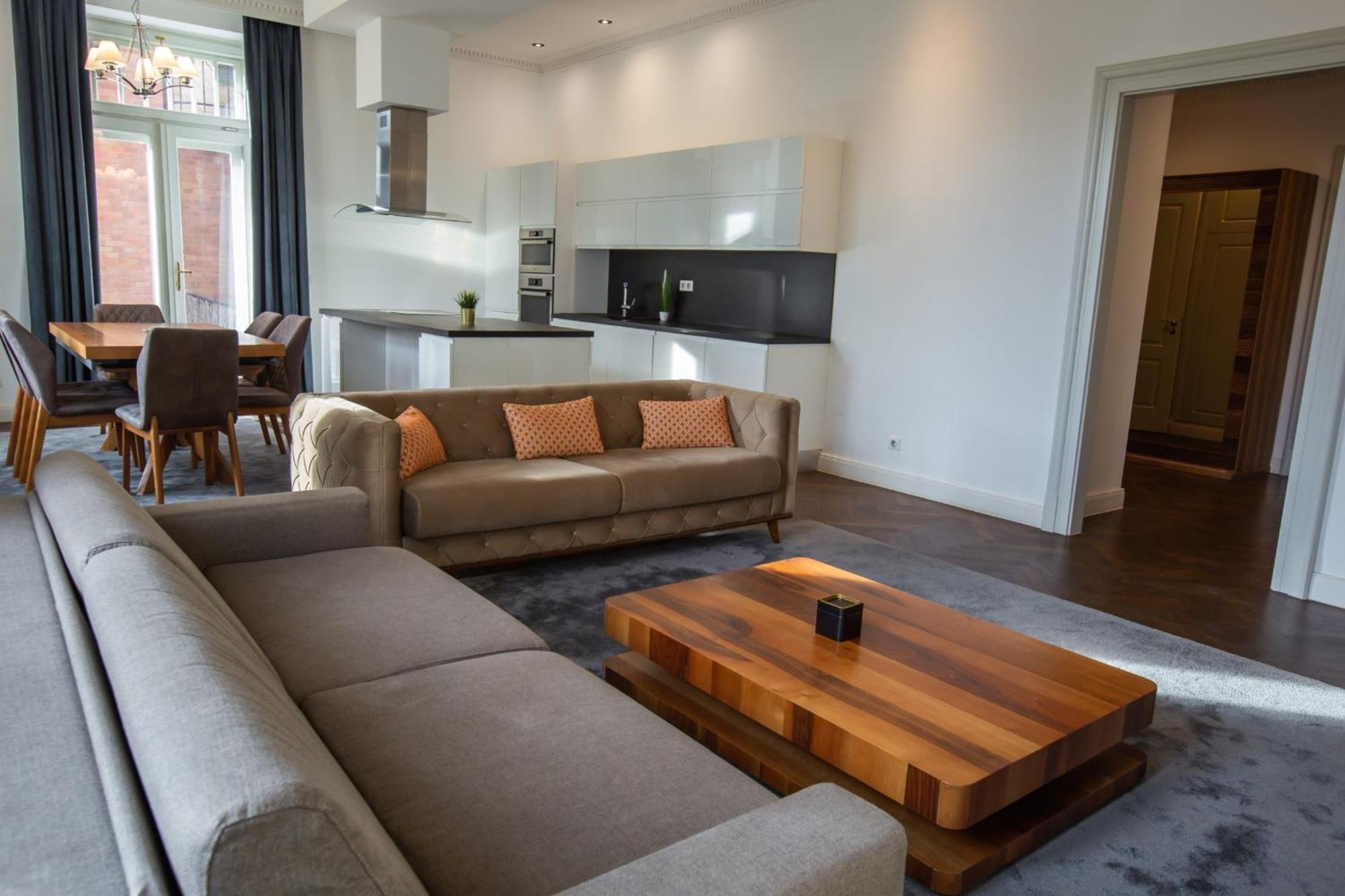 Zoya Luxury Residence Budapest Ngoại thất bức ảnh A living room in a serviced apartment in Amsterdam, Netherlands